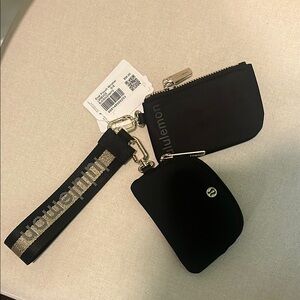 TRENDY: Lululemon Black and Gold Dual Pouch Wristlet